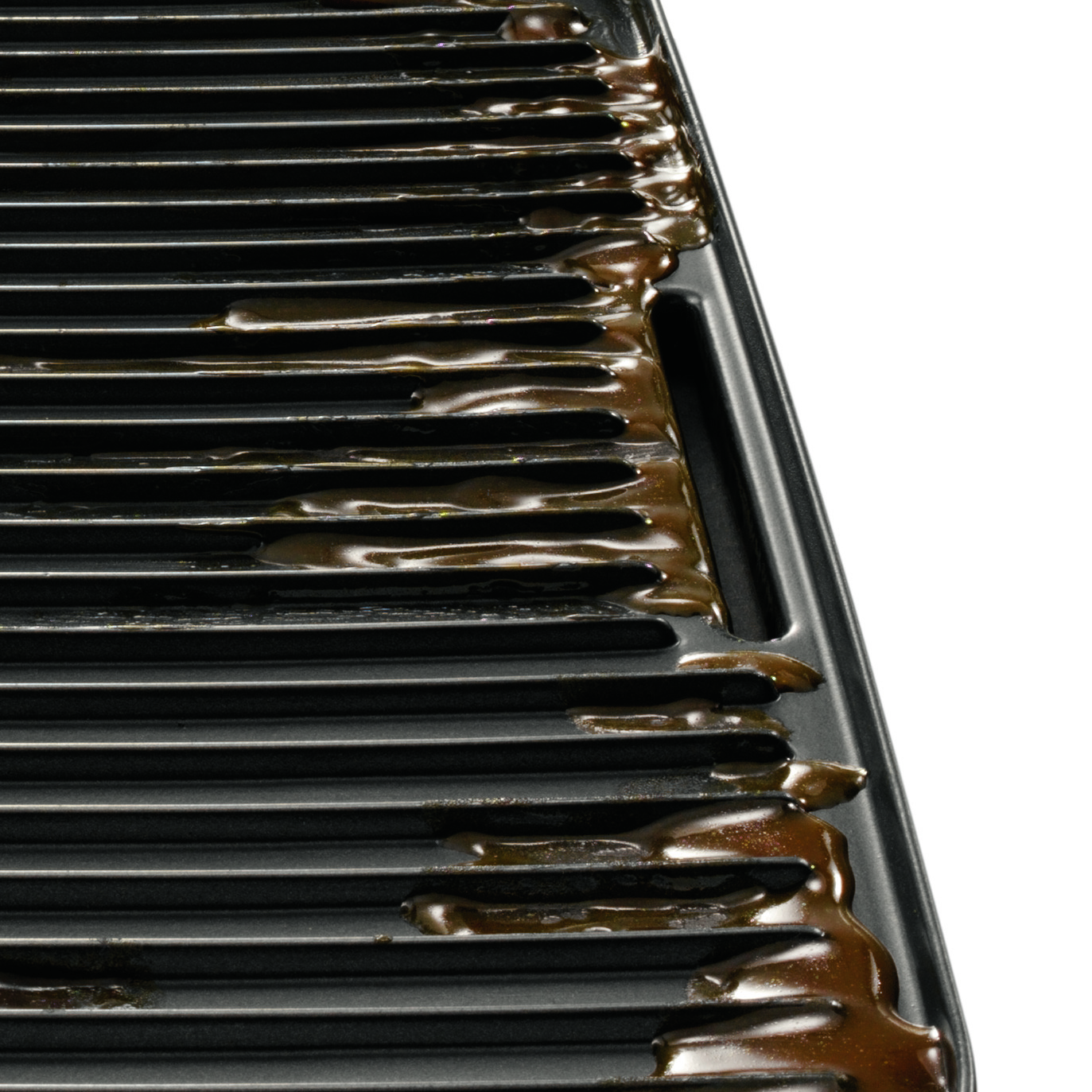 Placa de grill inclinada para escurrir el exceso de grasa