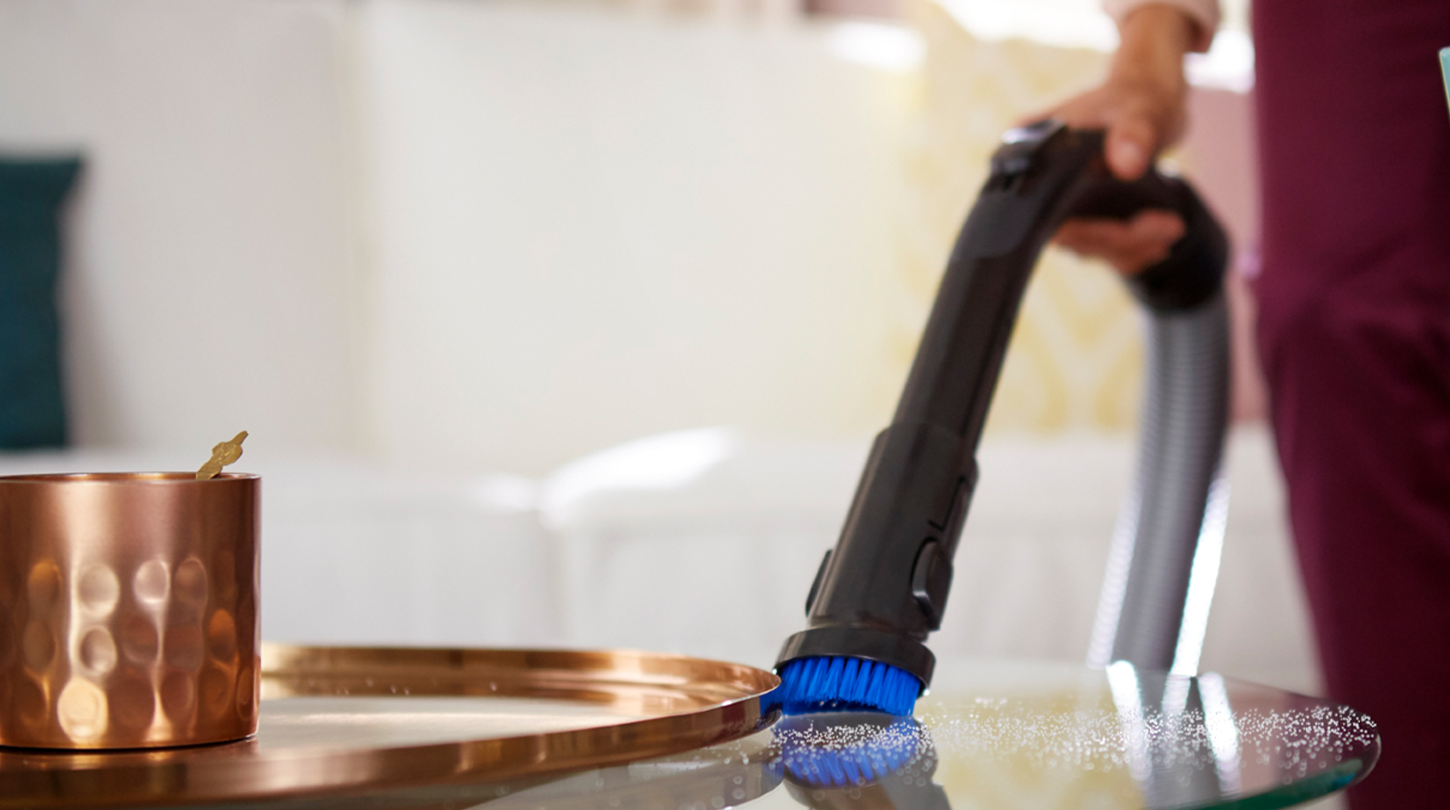 Escova macia integrada na pega, sempre pronta a utilizar